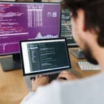 image of focused caucasian programmer man working fq8v7c6